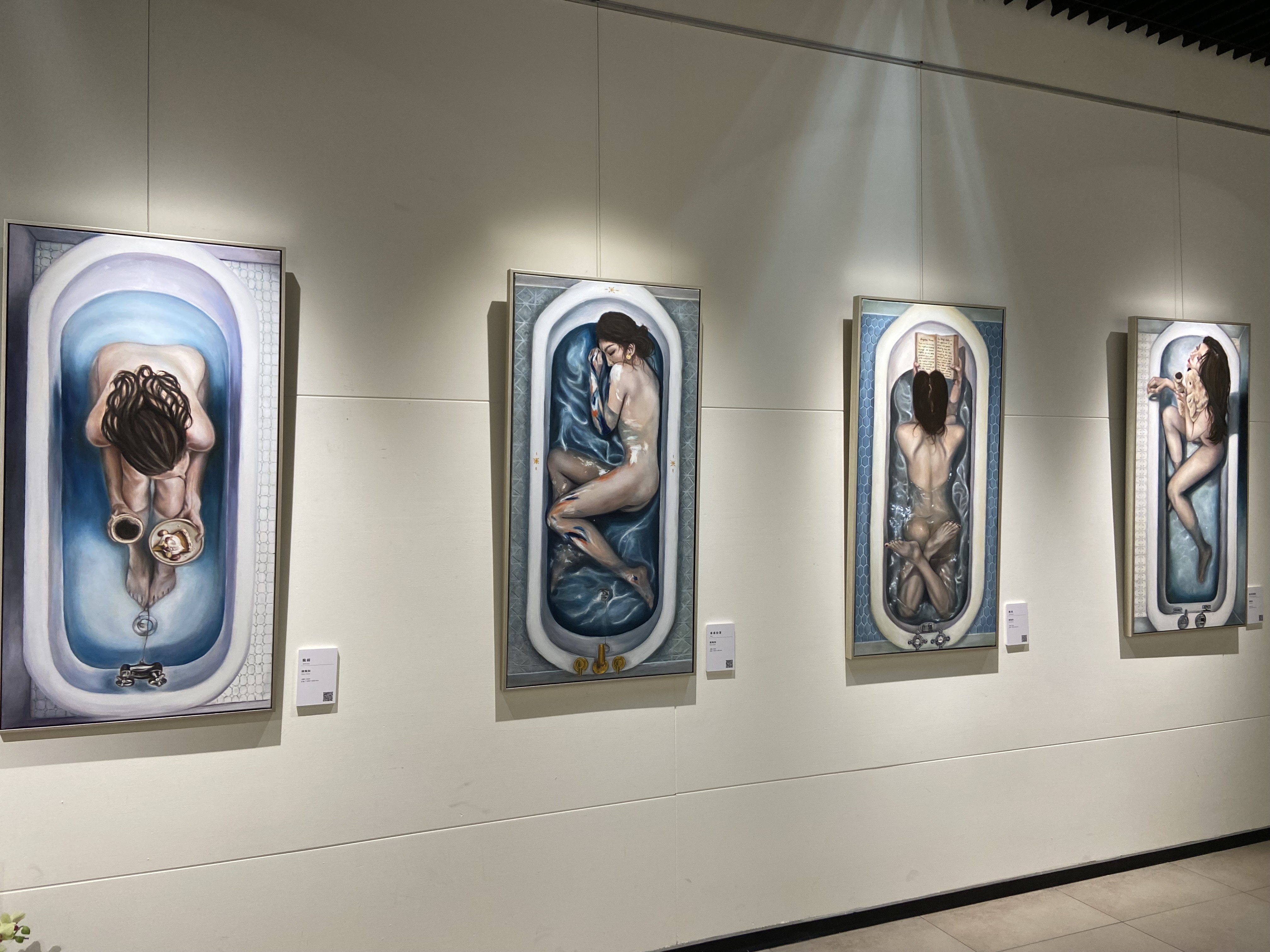 Nude painting in a bathtub in an exhibition